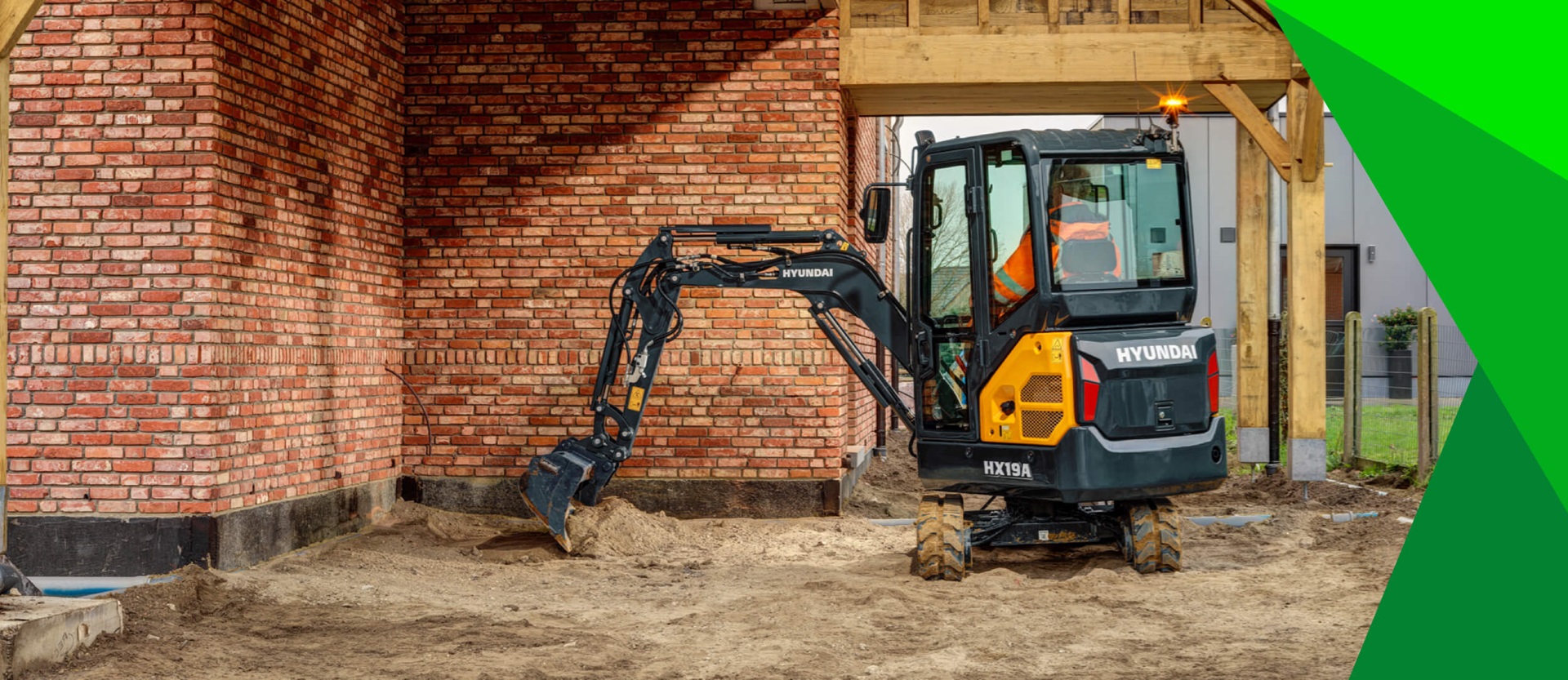 HD Hyundai HX19A Mini Excavator Digging Inside Residential
