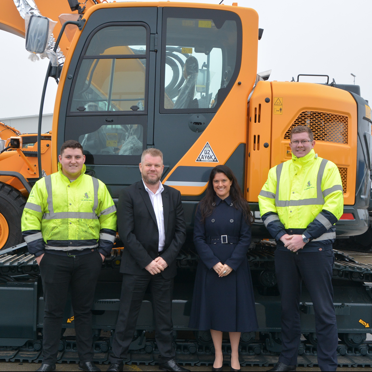 Tony Reeves hyundai Datatag in front of the first machines fitted with Datatag CESAR marking