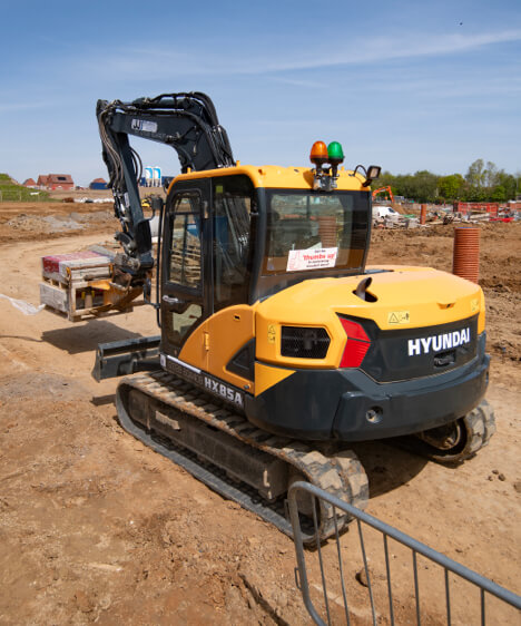 HD Hyundai HX85A Compact Excavator Housing Site