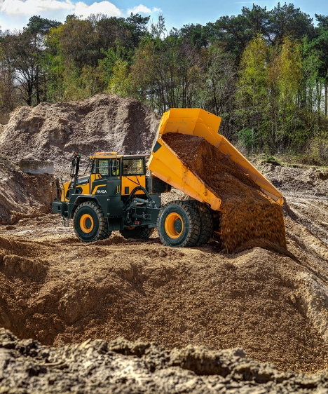 HA45A 4x4 Articulated Dump Truck dumping dirt