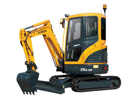 R25Z-9AK compact excavator, stationary on a white background