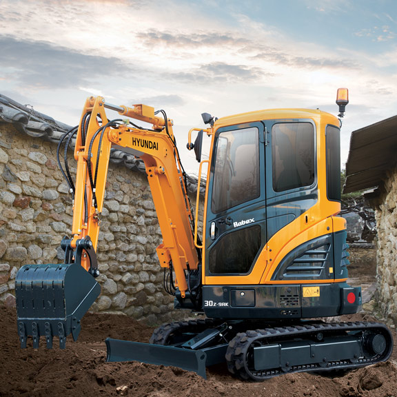 R30Z-9AK compact excavator operating in a confined space