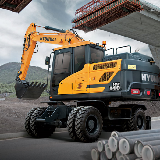 hw140-hyundai-wheeled-excavator-in-the-field-roadwork