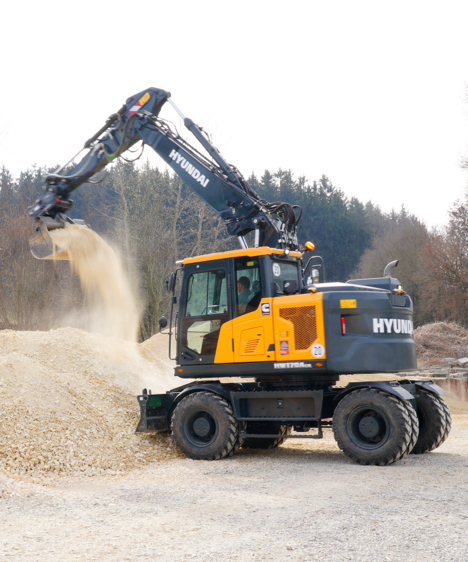 La pelle HD Hyundai HW170 CR déplaçant du gravier