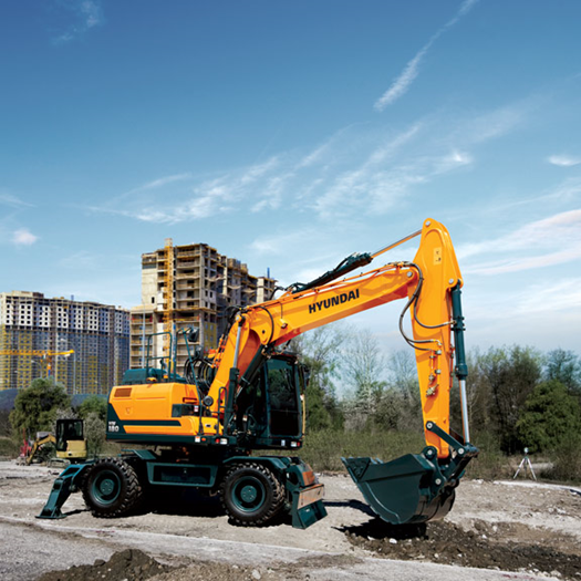 hw180-hyundai-wheeled-excavator-in-the-field-roadwork